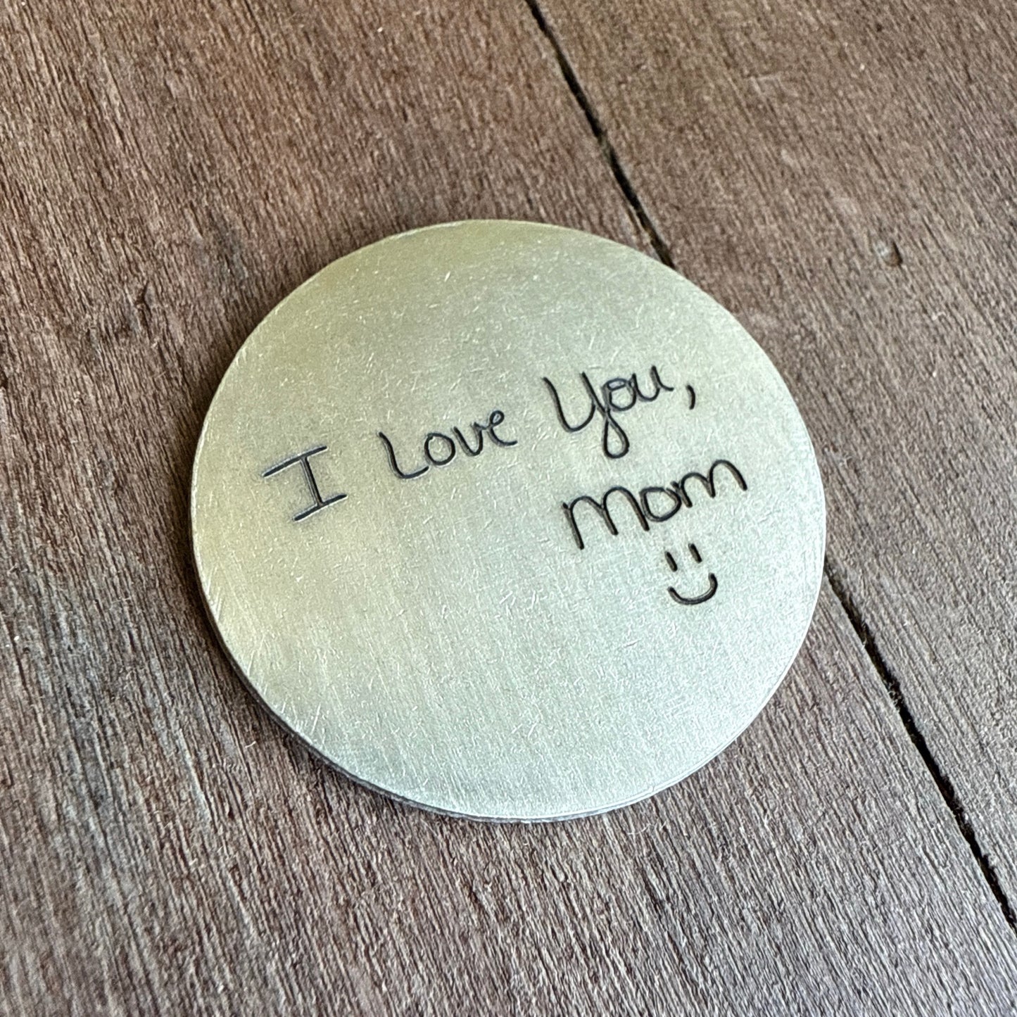 brass coin with handwriting of loved one engraved by kyleemae designs