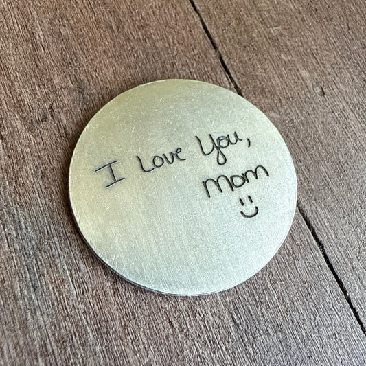 brass coin with handwriting of loved one engraved by kyleemae designs
