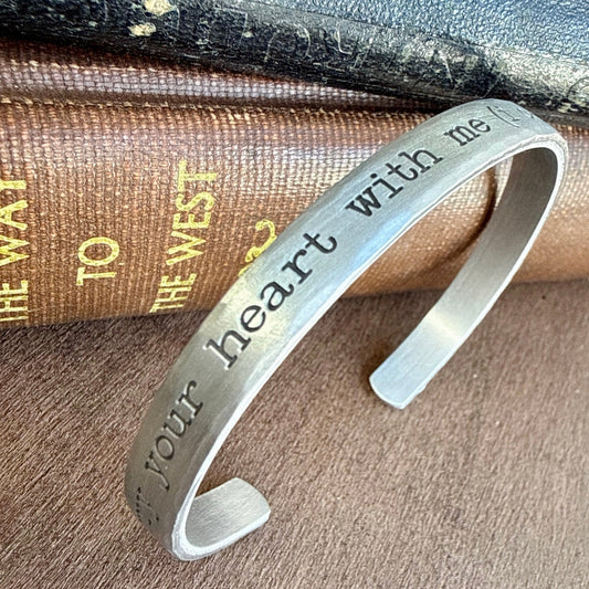 Silver bracelet with 'i carry your heart with me (i carry it in my heart)' engraved