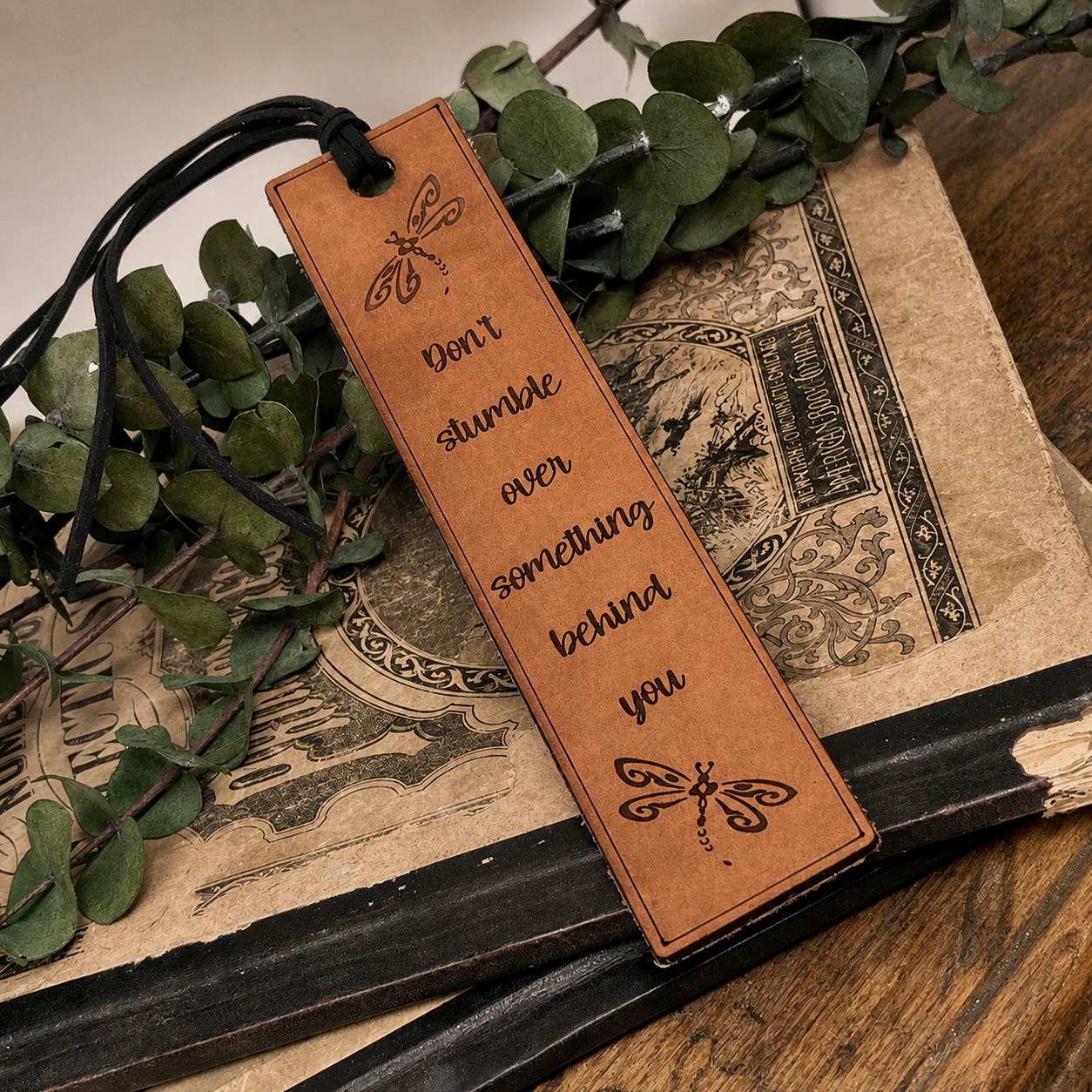 Don’t Stumble Over Something Behind You — Leather Bookmark