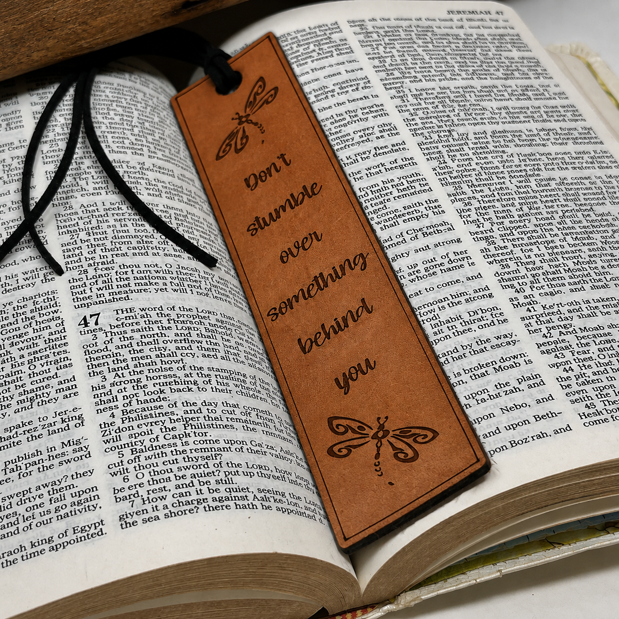 Don’t Stumble Over Something Behind You — Leather Bookmark